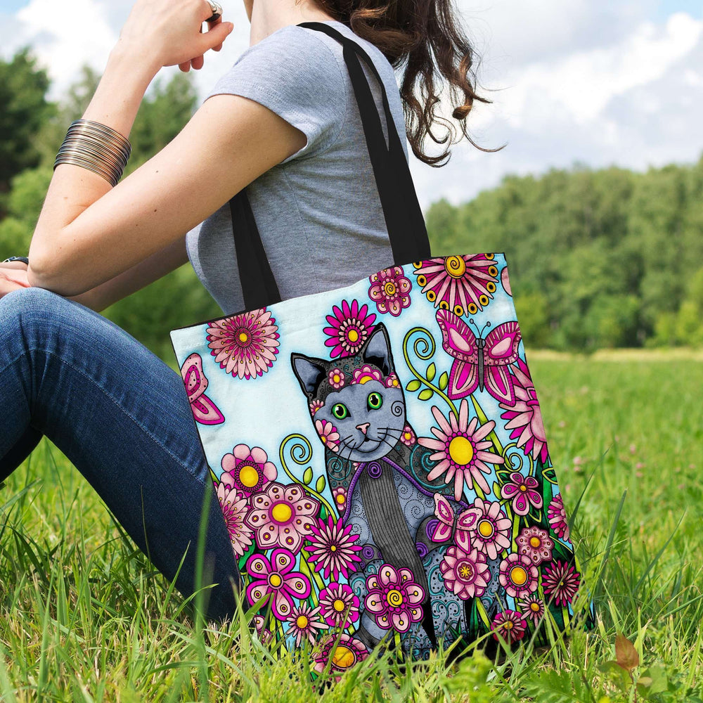 Designs by MyUtopia Shout Out:Cat Playing in a Field of Pink Flowers Fabric Totebag Reusable Shopping Tote