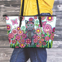 Load image into Gallery viewer, Designs by MyUtopia Shout Out:Cat Playing in a Field of Pink Flowers Faux Leather Totebag Purse,Medium (10 T x 16 x 5) / Multicolor,tote bag purse
