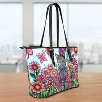Load image into Gallery viewer, Designs by MyUtopia Shout Out:Cat Playing in a Field of Pink Flowers Faux Leather Totebag Purse
