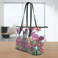 Load image into Gallery viewer, Designs by MyUtopia Shout Out:Cat Playing in a Field of Pink Flowers Faux Leather Totebag Purse
