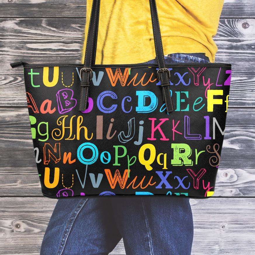 Designs by MyUtopia Shout Out:Colorful Alphabet Grade School Teacher Faux Leather Totebag Purse,Medium (10 x 16 x 5) / Multicolor,tote bag purse