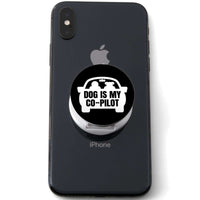 Load image into Gallery viewer, Designs by MyUtopia Shout Out:Dog is My Co-Pilot Hinged Phone Grip and Stand for Smartphones and Tablets
