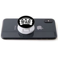 Load image into Gallery viewer, Designs by MyUtopia Shout Out:Dog is My Co-Pilot Hinged Phone Grip and Stand for Smartphones and Tablets
