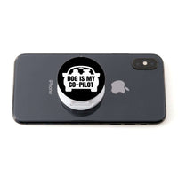 Load image into Gallery viewer, Designs by MyUtopia Shout Out:Dog is My Co-Pilot Hinged Phone Grip and Stand for Smartphones and Tablets
