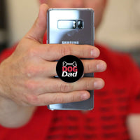 Load image into Gallery viewer, Designs by MyUtopia Shout Out:Dog Parent with Bone Hinged Pop-out Phone Grip and Stand for Smartphones and Tablets
