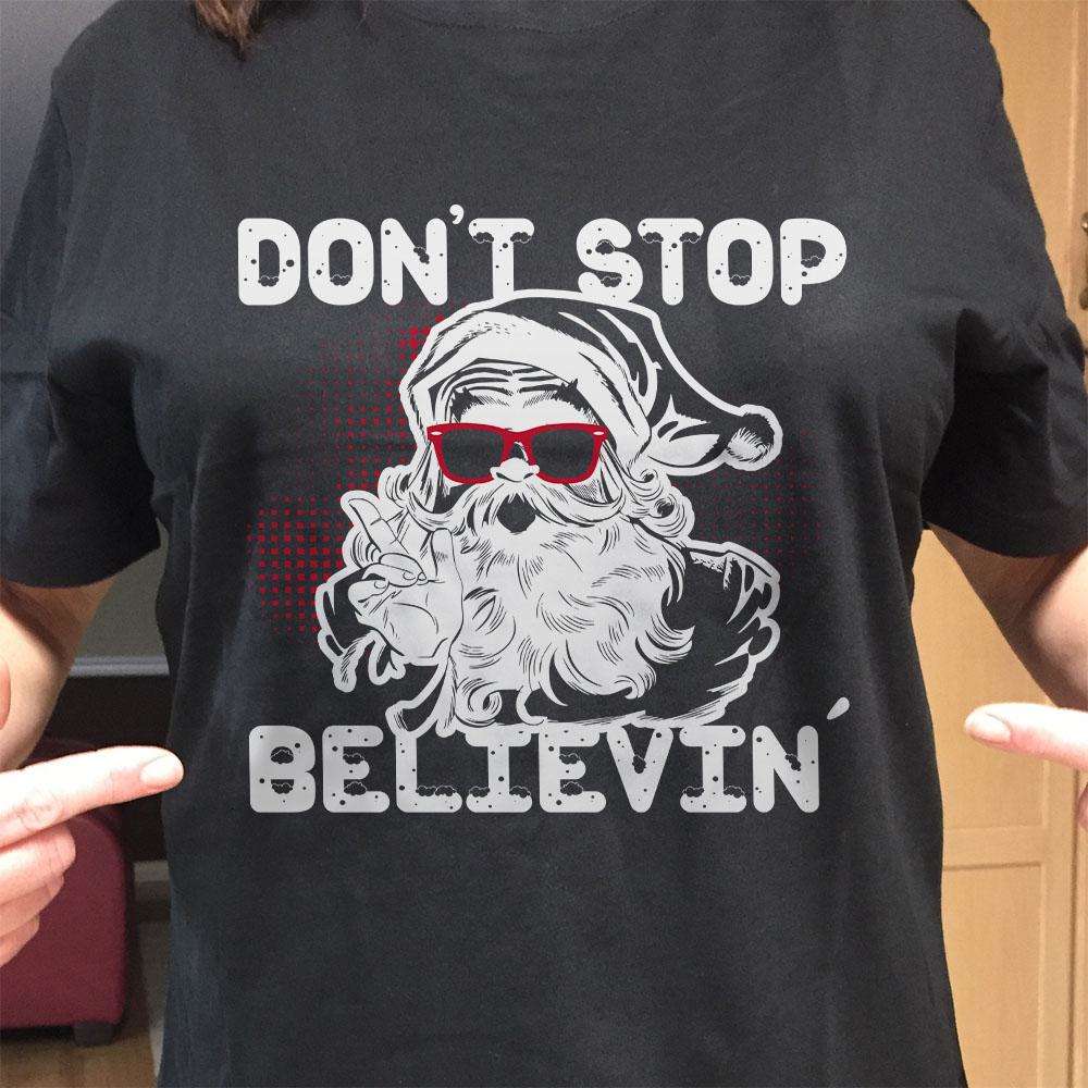 Designs by MyUtopia Shout Out:Don't Stop Believin' Santa Adult Unisex T-Shirt