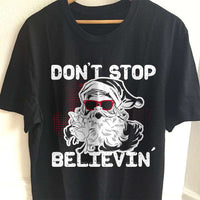 Load image into Gallery viewer, Designs by MyUtopia Shout Out:Don&#39;t Stop Believin&#39; Santa Adult Unisex T-Shirt
