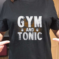 Load image into Gallery viewer, Designs by MyUtopia Shout Out:Gym and Tonic Adult Unisex Black T-Shirt
