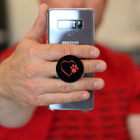 Load image into Gallery viewer, Designs by MyUtopia Shout Out:Heart Dog Paw (Black) Hinged Phone Grip and Stand for Smartphones and Tablets
