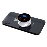 Load image into Gallery viewer, Designs by MyUtopia Shout Out:Heart w Blue Dog Paw (on Black) Hinged Phone Grip and Stand for Smartphones and Tablets

