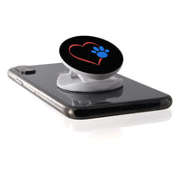 Load image into Gallery viewer, Designs by MyUtopia Shout Out:Heart w Blue Dog Paw (on Black) Hinged Phone Grip and Stand for Smartphones and Tablets
