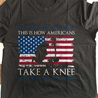 Load image into Gallery viewer, Designs by MyUtopia Shout Out:How Americans Take A Knee Adult Unisex Cotton Short Sleeve T-Shirt
