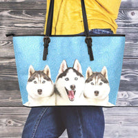 Load image into Gallery viewer, Designs by MyUtopia Shout Out:Husky Puppies Faux Leather Totebag Purse,Medium (10 x 16 x 5) / Light Blue,tote bag purse
