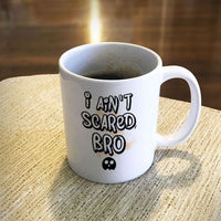 Load image into Gallery viewer, Designs by MyUtopia Shout Out:I Ain&#39;t Scared Bro White Ceramic Coffee Mug,11oz / White,Ceramic Coffee Mug
