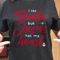 Load image into Gallery viewer, Designs by MyUtopia Shout Out:I Like Santa But Jesus Has My Heart Adult Unisex T-Shirt

