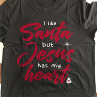 Load image into Gallery viewer, Designs by MyUtopia Shout Out:I Like Santa But Jesus Has My Heart Adult Unisex T-Shirt

