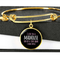 Load image into Gallery viewer, Designs by MyUtopia Shout Out:I Live in a MadHouse Run By a Tiny Army I Made Engravable Keepsake Bangle Round Bracelet - Black,Gold / No,Bracelets
