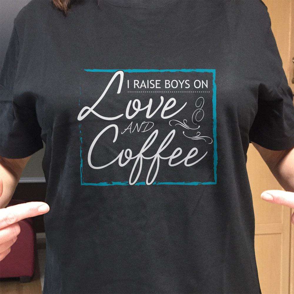 Designs by MyUtopia Shout Out:I Raise Boys On Love and Coffee Adult Unisex T-Shirt