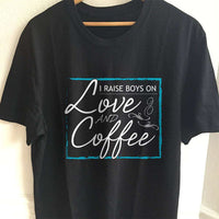 Load image into Gallery viewer, Designs by MyUtopia Shout Out:I Raise Boys On Love and Coffee Adult Unisex T-Shirt,S / Black,Adult Unisex T-Shirt
