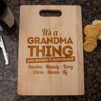 Load image into Gallery viewer, Designs by MyUtopia Shout Out:It&#39;s A Grandma Thing Personalized with Kids Names Engraved Maple Cutting Board
