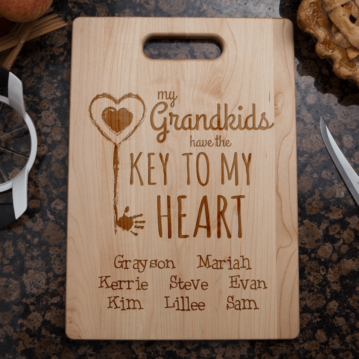 Designs by MyUtopia Shout Out:Key To Grandma's Heart Engraved Cutting Board Personalized Gift