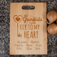 Load image into Gallery viewer, Designs by MyUtopia Shout Out:Key To Grandma&#39;s Heart Engraved Cutting Board Personalized Gift
