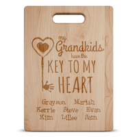 Load image into Gallery viewer, Designs by MyUtopia Shout Out:Key To Grandma&#39;s Heart Engraved Cutting Board Personalized Gift
