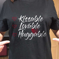 Load image into Gallery viewer, Designs by MyUtopia Shout Out:Kissable Huggable Lovable Valentines Day Humor Adult Unisex T-Shirt
