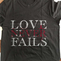 Load image into Gallery viewer, Designs by MyUtopia Shout Out:Love Never Fails Adult Unisex T-Shirt
