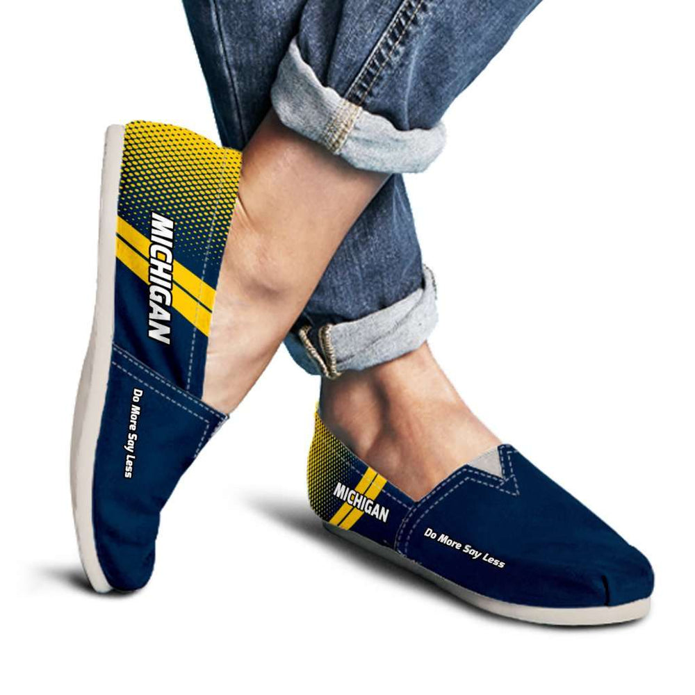 Designs by MyUtopia Shout Out:Michigan Do More Say Less Wolverines Basketball Fan Casual Canvas Slip on flats