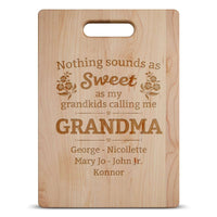 Load image into Gallery viewer, Designs by MyUtopia Shout Out:Nothing Sounds As Sweet as being called Grandma Engraved Cutting Board Personalized Gift
