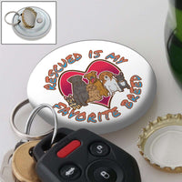 Load image into Gallery viewer, Designs by MyUtopia Shout Out:Rescued is my Favorite Dog Breed Magnetic Keychain and bottle opener
