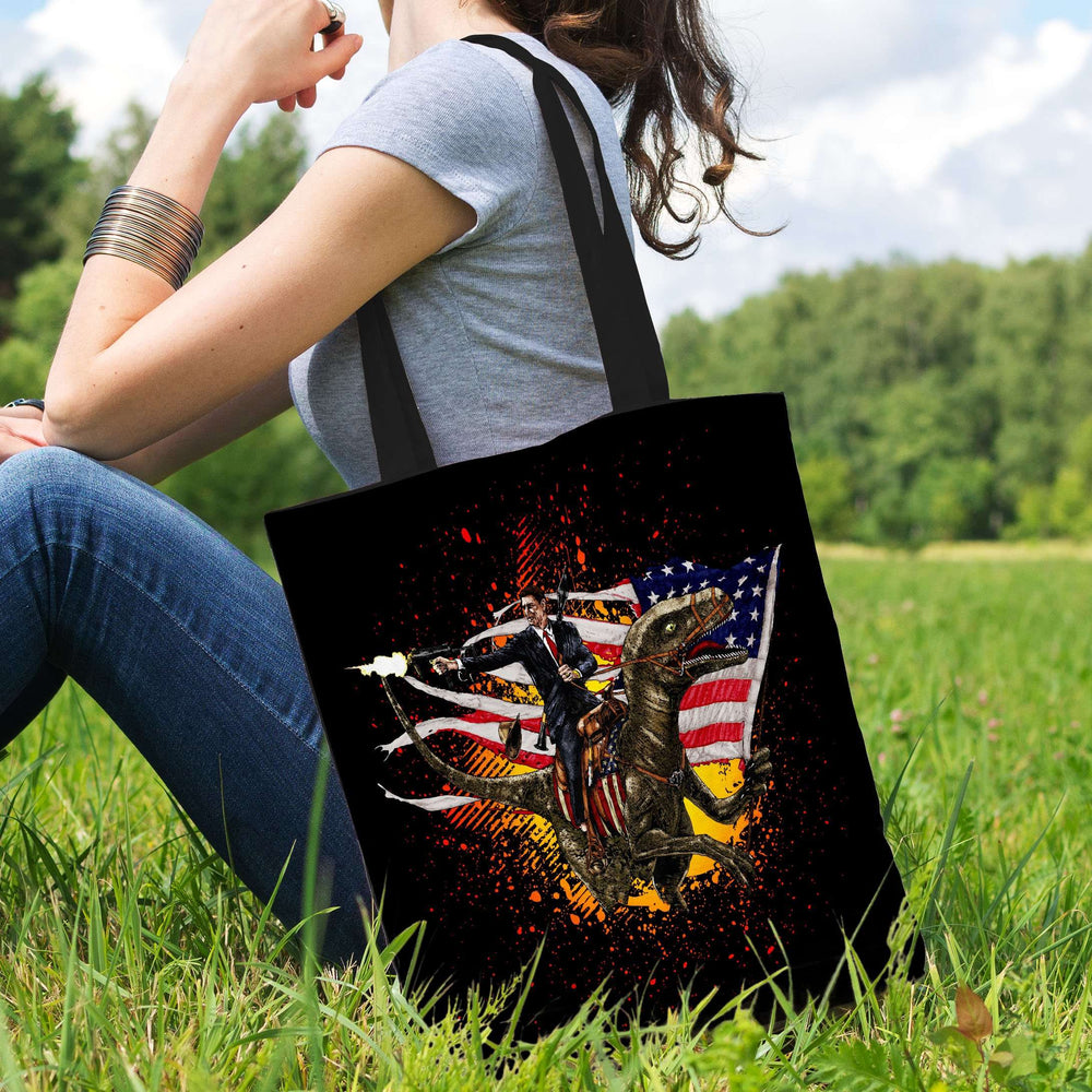 Designs by MyUtopia Shout Out:Ronald Reagan Velociraptor US Flag Global Warming Fabric Totebag Reusable Shopping Tote