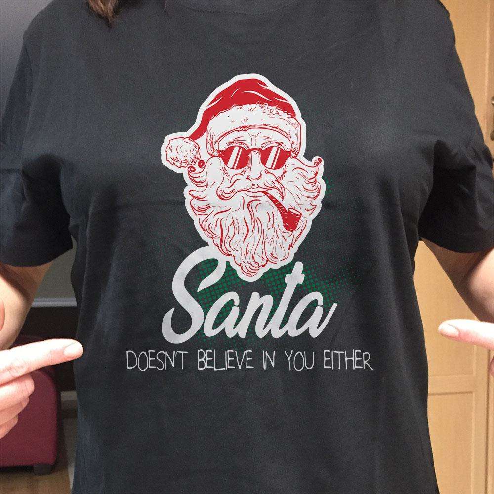 Designs by MyUtopia Shout Out:Santa Doesn't Believe In You Either Adult Unisex T-Shirt