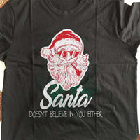 Load image into Gallery viewer, Designs by MyUtopia Shout Out:Santa Doesn&#39;t Believe In You Either Adult Unisex T-Shirt
