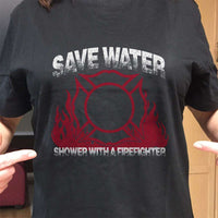 Load image into Gallery viewer, Designs by MyUtopia Shout Out:Save Water Shower With A Firefighter Adult Unisex Black T-Shirt
