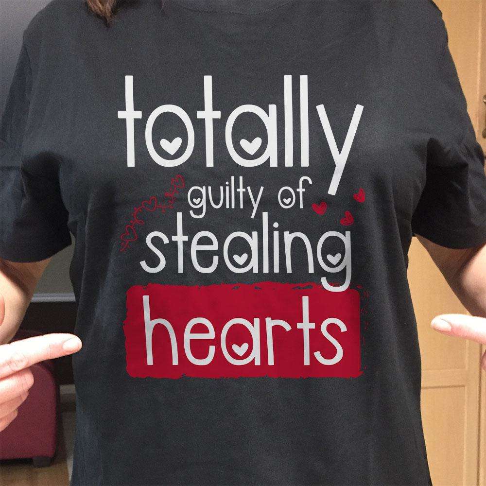 Designs by MyUtopia Shout Out:Totally Guilty of Stealing Hearts Valentines Day Humor Adult Unisex T-Shirt