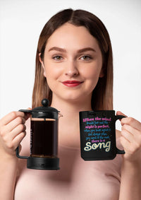 Load image into Gallery viewer, Designs by MyUtopia Shout Out:When you Need it the Most There Is A Song Ceramic Coffee Mug - Black
