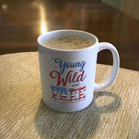 Load image into Gallery viewer, Designs by MyUtopia Shout Out:Young Wild and Free White Coffee Mug
